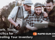 Three hunters examining a tablet outdoors, discussing inventory reports and tools that syncs to their POS in real-time. One holds a shotgun. In this Rapid Gun Systems webinar, you will learn how to leverage your point-of-sale system for controlling gun inventory.